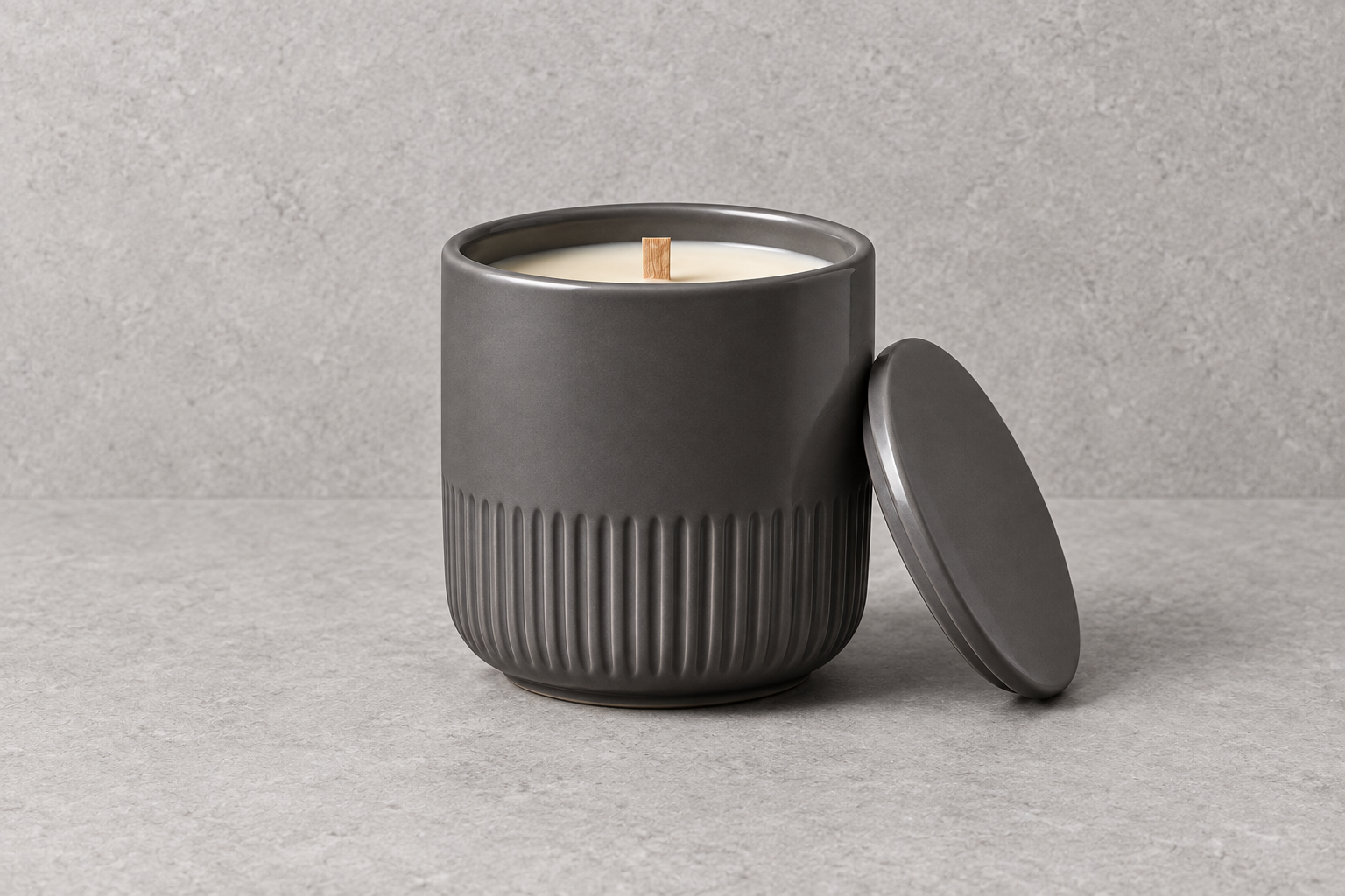 Freesia candle in a charcoal porcelain vessel